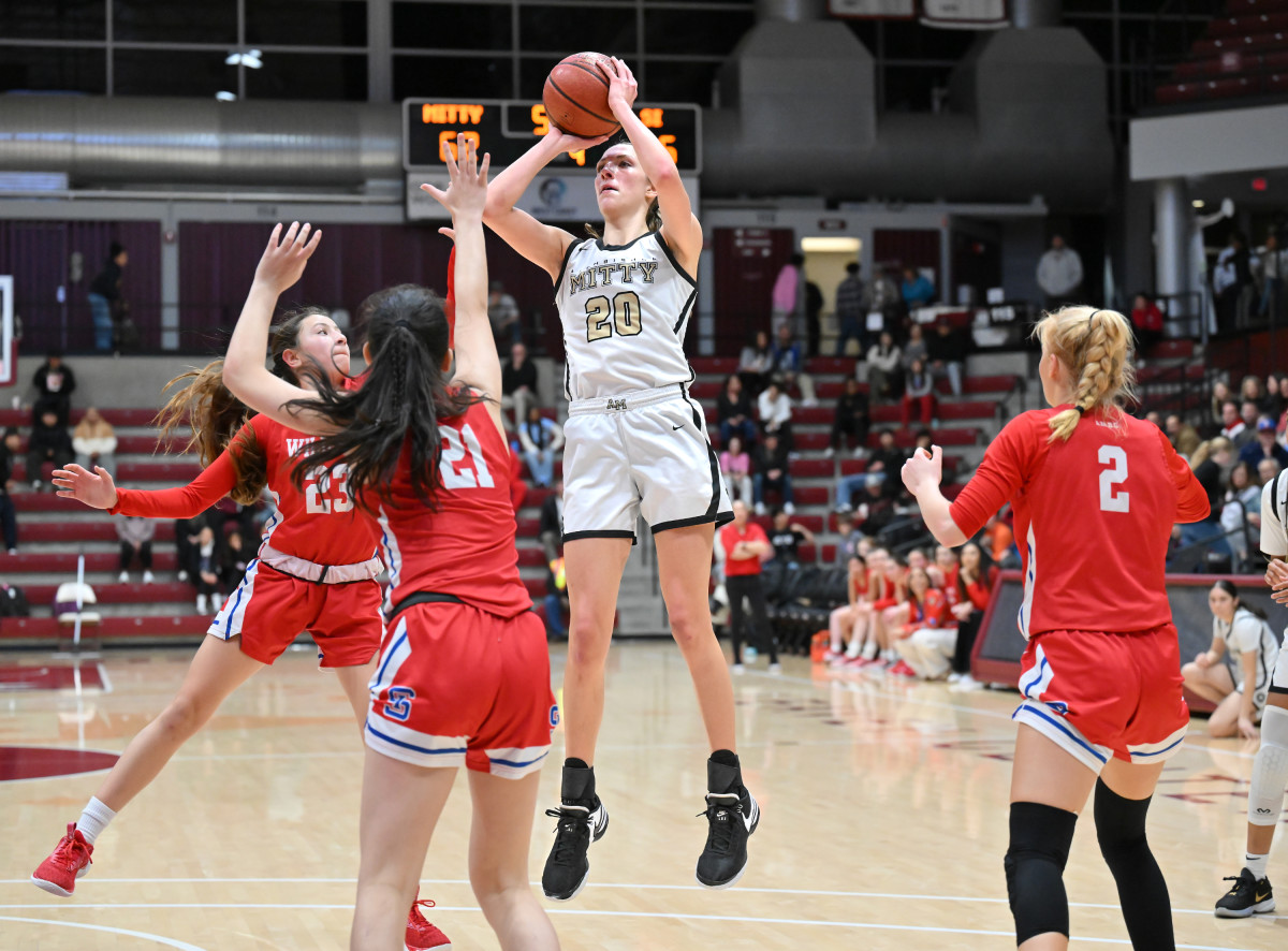 It's difficult guarding 6-foot-2 leaper McKenna Woliczko (20)